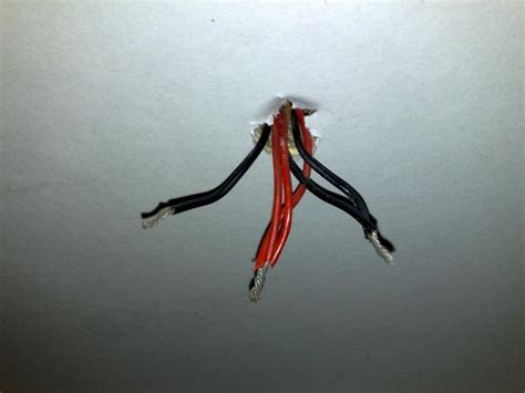 You should have a bare copper wire coming from the ceiling. Replace ceiling light fixture | DIYnot Forums