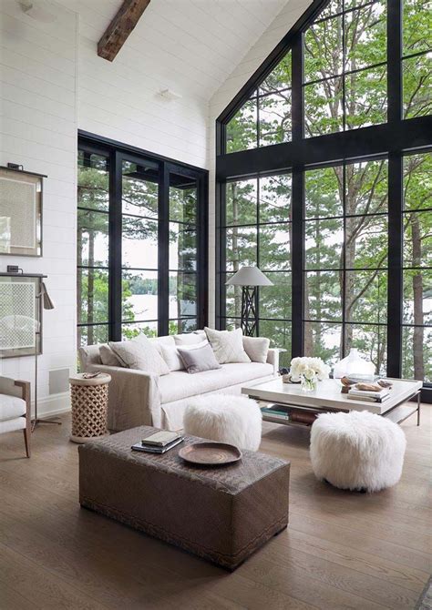 Decorating your lake house with elements like kayak paddles or snowshoes is a great way to blend a sense of outdoor adventure with the interior of your space. Dreamy rustic-modern lake house with sweeping vistas of ...