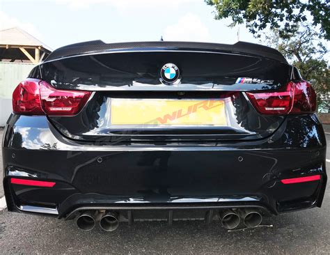 This professionally crafted performance style carbon fiber trunk spoiler for the bmw f82 m4 makes a huge difference in the aesthetics of your new m4! BMW M4 "CS" Carbon Rear Boot Spoiler - CarbonWurks Custom Carbon Fibre