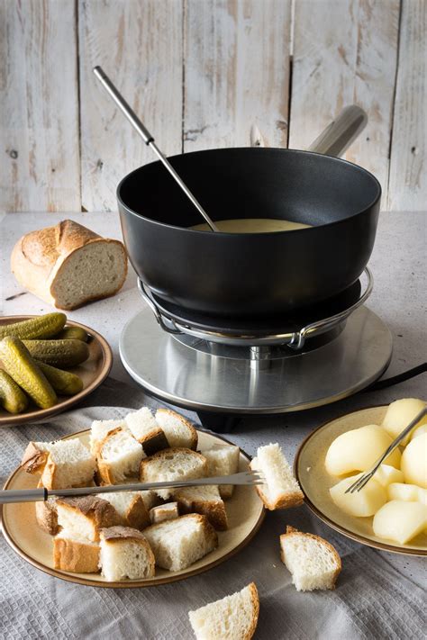 Since some people asked, no this is not an instant fondue mix! Traditional Swiss Cheese Fondue | Lauren Caris Cooks ...