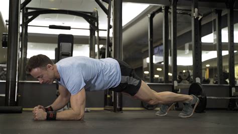 Muscular Man Practicing Elbow Plank Exercise Stock Footage Sbv