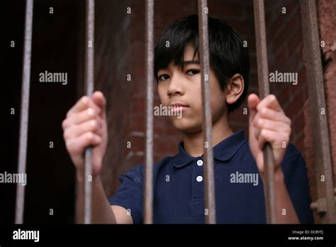 Boy Behind Bars Prison Hi Res Stock Photography And Images Alamy