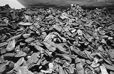 auschwitz concentration camp pile boots holocaust mass murder history human photograph largest