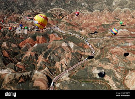 An Aerial View Of Both Balloons And Zhangye National Geopark Which Is
