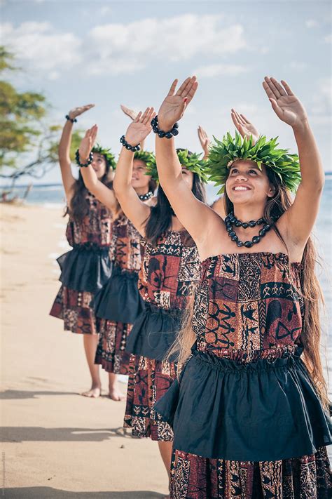 Group Of Teenage Traditional Hawaiian Hula Dancers Performing On The Beach By Stocksy