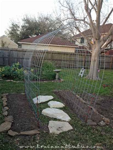 For prolific results, provide cucumber vines with a way to climb, keeping cucumber fruits off. 18 DIY Garden Trellis Projects
