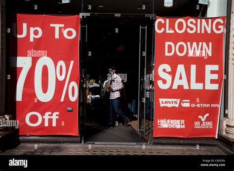 Closing Down Sale Signs Of A Retail Shop In Central London Uk Due To