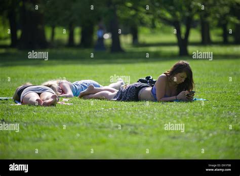 People Sunbathing In Bute Park Cardiff Uk On A Hot Summer S Day