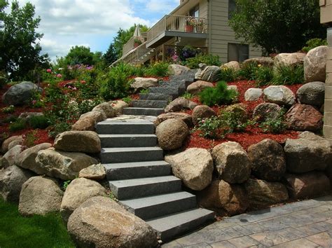 A Retaining Wall In Minneapolis Rock Wall Landscape Landscaping