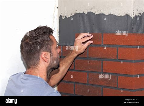Reconstruction Of The House Worker Stuck Brick Cladding Imitation