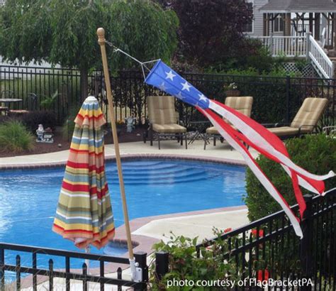 The new all steel flag mounting bracket that takes seconds to fasten securely anywhere using fence, deck rail, and almost anything with pickets or spindles. Innovative Banner Flag Brackets