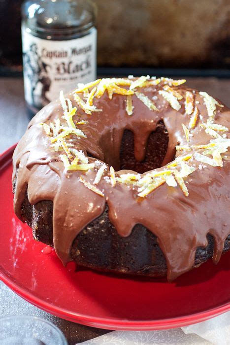 Stir together the rum and maple syrup, then slowly spoon over the cake. Candied Citrus and Chocolate Rum Cake #CaptainsTable ...