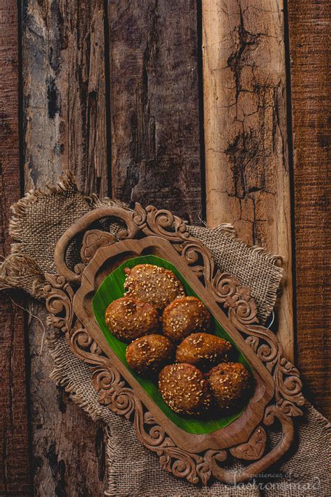 The crispy outer layer surrounds soft insides. Poda Pitha | Experiences of a Gastronomad