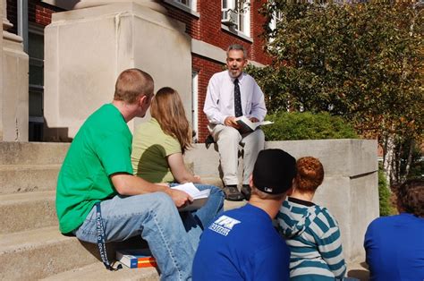Dr Merrit Teaches An English Class On The Steps Of Lansdell Hall Find