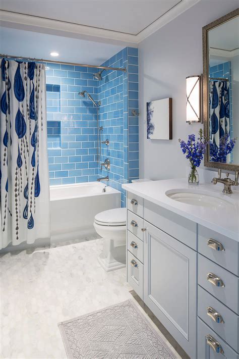 Master bath design with soft blue glass subway tile carrara marble and glamorous light fixture blue bathroom tile bathroom design decor bathroom decor colors. Traditional Coastal Home with Classic White Kitchen - Home ...