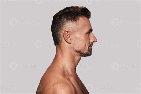 Shirtless Man Side View Of Good Looking Young Man Smiling While