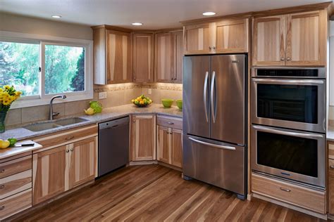 There are different colors that you can use to enhance the look of the cabinet and to also set the mood of the kitchen along with the entire theme. Hickory Cabinet Kitchen Remodel | Powell Construction