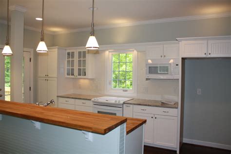 Cottage kitchen cabinets kitchen cabinetry kitchen redo new kitchen room kitchen dining room kitchen ideas cheap kitchen distressed beadboard cabinet redo. Mayo Lake Cottage kitchen butcher block counter beadboard ...
