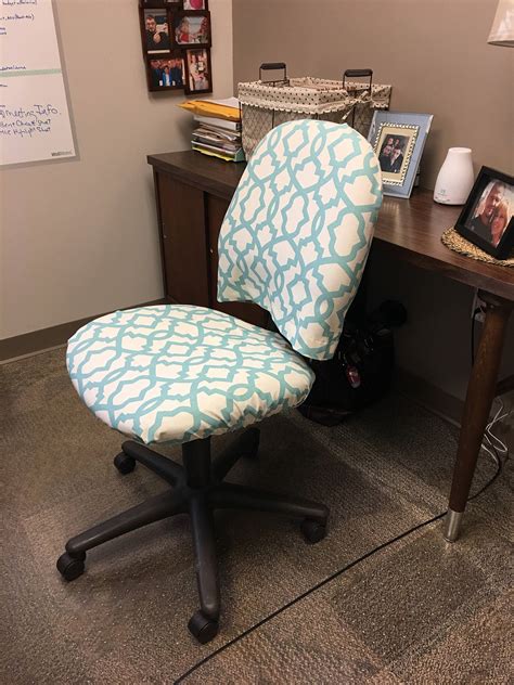 Raise and lower the seat using the pneumatic seat height adjustment lever, conveniently located below the seat. Office Chair seat and back covers with Monogram Dorm chair
