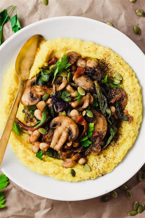 Polenta is a versatile ingredient, boiled cornmeal that can be served creamy and thick, or set and sliced. Creamy Vegan Polenta with Mushrooms and Beans