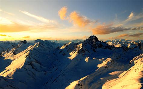 Sunset Over Snow Capped Mountains Full Hd Wallpaper And Background