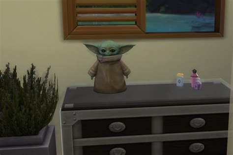 A Strangely Lifeless Baby Yoda Is Now In The Sims 4 Polygon