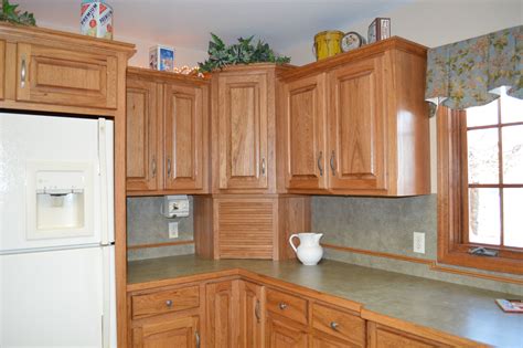 Garage bike storage is quite simple yet effective to securely and safely hang or wall mount your bikes with space. Appliance Garage | Kitchen cabinets, Home decor, Appliance ...