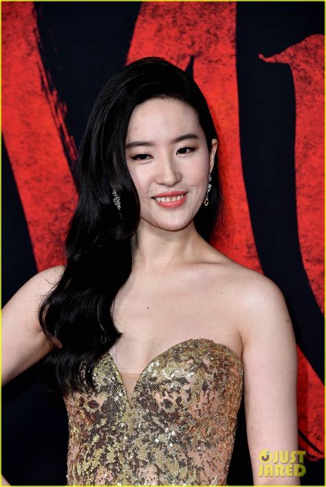 yifei liu the star of disney s mulan remake looks stunning at the l a premiere photo