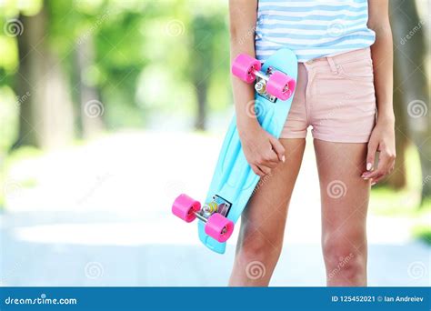 Girl Holding Skateboard Stock Image Image Of Legs Deck 125452021