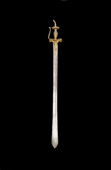 bonhams an unusual gold koftgari hilted steel sword india 19th century 2