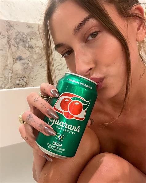 hailey bieber gives her glazed donut nails a chocolate update