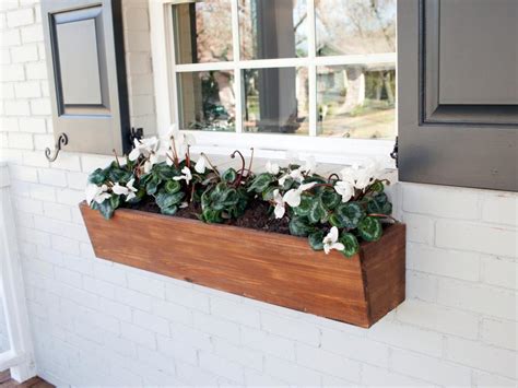 Step up your curb appeal with these flower boxes and window box planters. Renovation Lessons from Fixer Upper - Michaela Noelle Designs