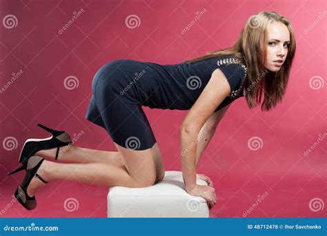 Attractive Slender Graceful Girl On Her Knees Stock Photo Image Of