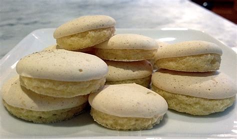 Dip cooled cookies in icing, coating completely; A Cake Bakes in Brooklyn: Elaine's Anise Cookies