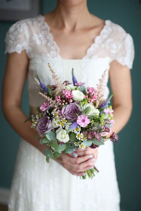 This way, you will learn a lot about how to design your own wedding. Picture Of a small ball like bouquet with pink, mauve ...