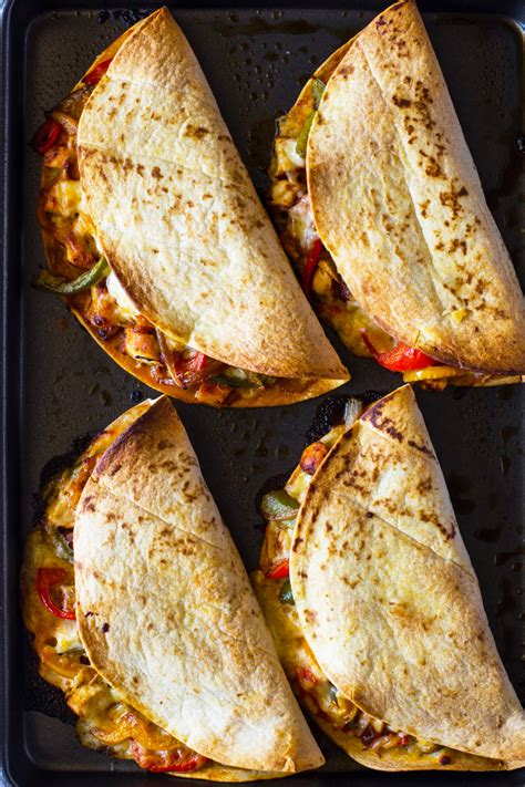 These easy chicken fajitas offer so much deliciousness for so little effort—we're pretty proud of serve the fajitas with warm tortillas, lime, cilantro, avocados and cheese if desired. Crispy Baked Chicken Fajita Quesadillas | Gimme Delicious