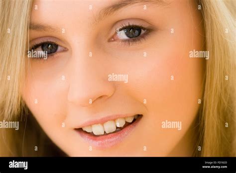 Close Up Of Face Of Very Pretty 16 18 Year Old Blonde Girl With Blue