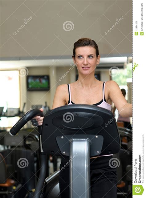 Girl Working Out On Treadmill At The Gym Stock Image