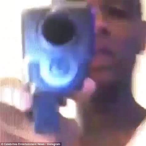 Black Kid Holding A Gun Meme