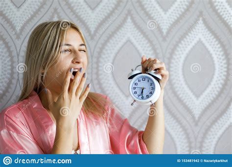 Beautiful Young Woman Wake Up In Morning Annoyed Alarm Clock Holding Hand Lifestyle Concept