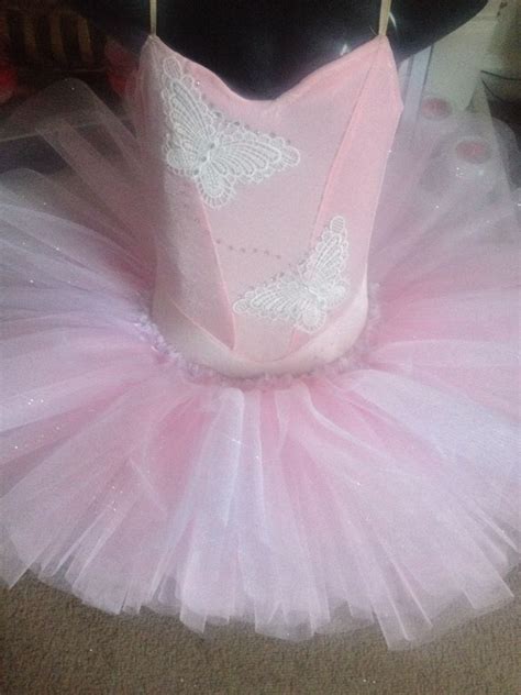 A Pretty Pink And White Butterfly Tutu With A Gorgeous Sparkly Top