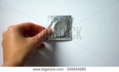 Hand Putting Condom On Image Photo Free Trial Bigstock