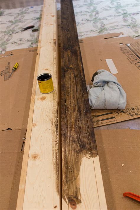 We determined the total ceiling length in the room and knew it needed to be be about 1/2″ short to allow us some wiggle room when installing. Kitchen Chronicles: DIY Wood Beams | Jenna Sue Design Blog