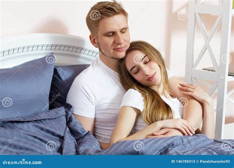 Happy Couple In Love On Morning Bed Young Loving Couple In The Bed