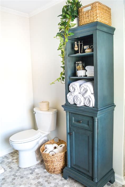 Tv cabinet to linen cabinet. How to Turn a Cabinet Into a Hamper in Seconds | Linen ...