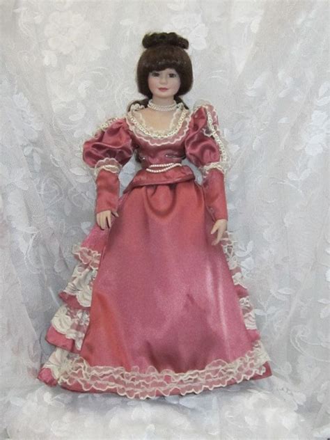 Vintage Collectible Porcelain And Cloth Doll Rose Colored Dress Rose