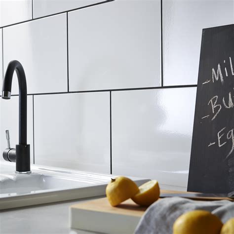 Its sole purpose is to protect the wall from splashes from the sink and traditional white, cream and steel make a functional kitchen look clean and classy, but don't hide away from using big. £10 per square metre B&Q Levanto White Ceramic Wall Tile ...