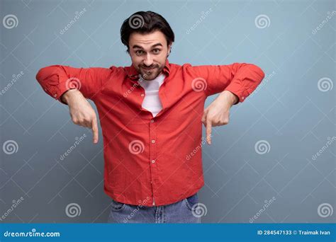 Cute Brutal Young Brunette Man Showing Thumbs Down Stock Image Image