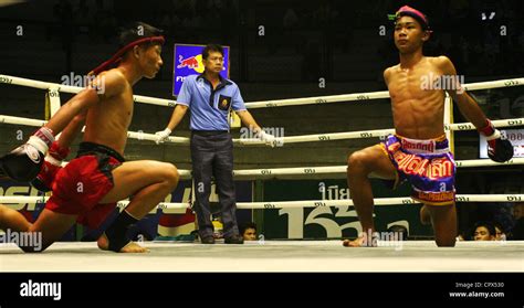 Muay Thai Boxers In Preparation For A Bout In The Rajadamern Stadium In