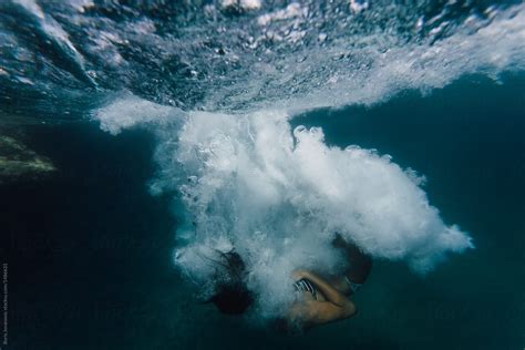 Woman Diving Into The Water By Stocksy Contributor Boris Jovanovic Stocksy